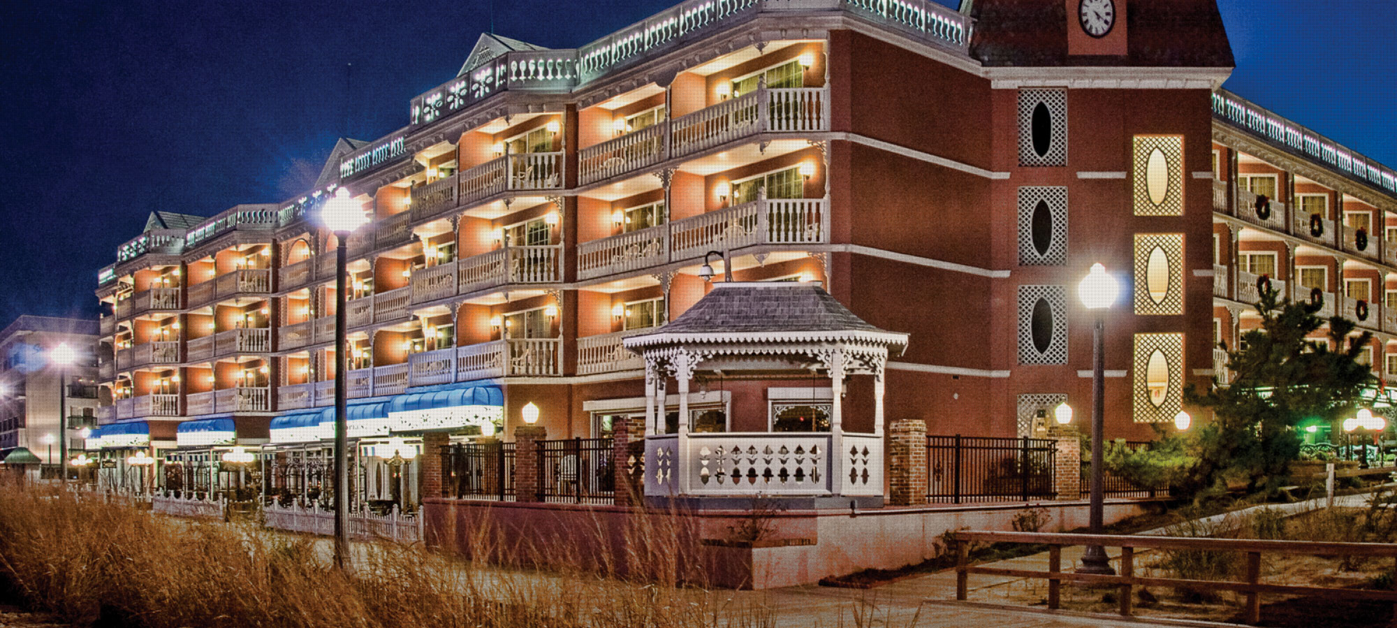 Boardwalk Plaza Hotel nighttime exterior picture in Rehoboth Beach DE