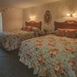 Rehoboth Beach DE Victorian styled hotel room with two medium beds