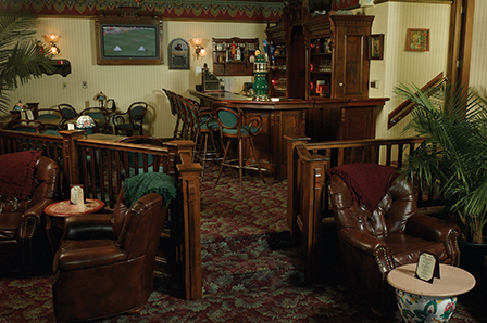 Pub bar with stools, chairs tables and sofas