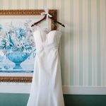 White wedding Dress hanging on hanger