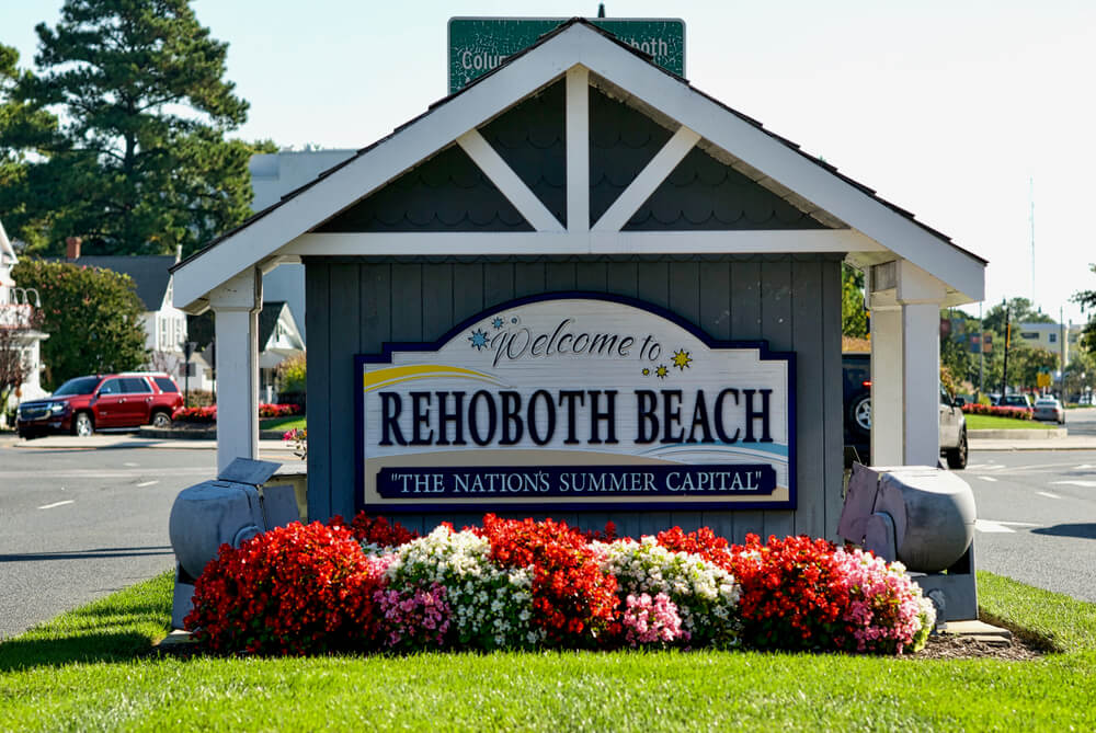 The town sign welcomes you during your vacation to watch the Rehoboth Beach Bandstand.