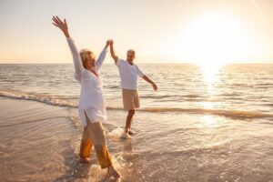 An older couple on the beach, one of the best anniversary date ideas in Rehoboth Beach!