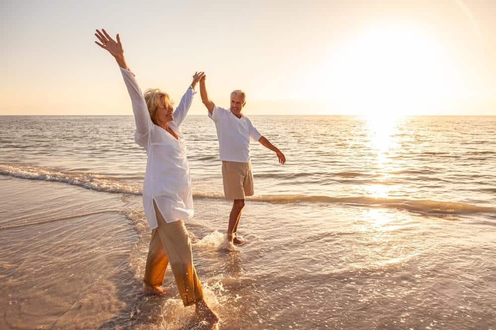 An older couple on the beach, one of the best anniversary date ideas in Rehoboth Beach!